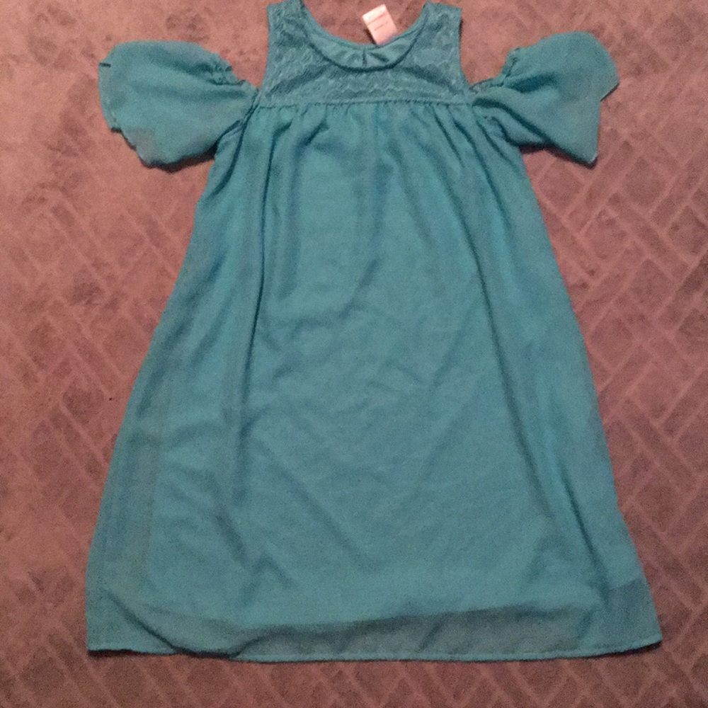 A blue off-the-shoulder dress